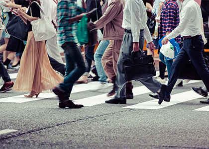 Crowd of people crossing street